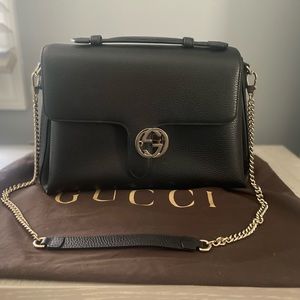 Authentic Gucci Handbag: worn 3/4 times. Cross body or as a satchel.